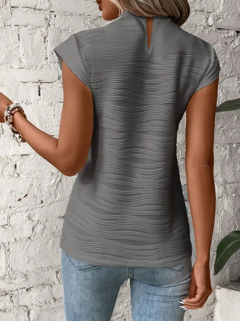Silona™ | Top sin mangas con textura ondulada y cuello alto