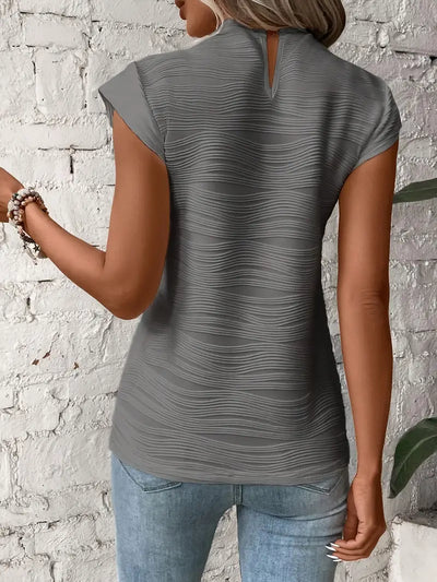 Silona™ | Top sin mangas con textura ondulada y cuello alto